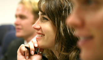 Student in lecture conducting survey